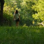 Person walking on a forest path