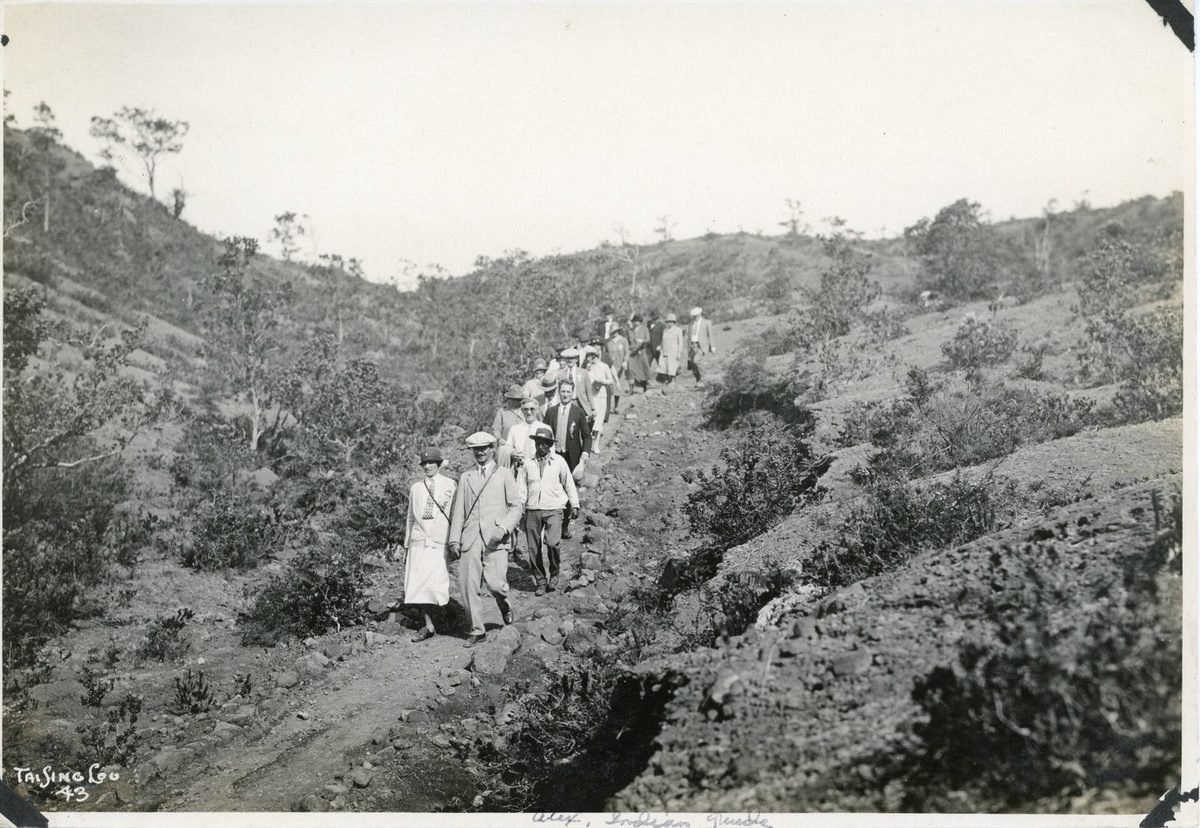 Visitors walking down a trail in Hawaii National Park